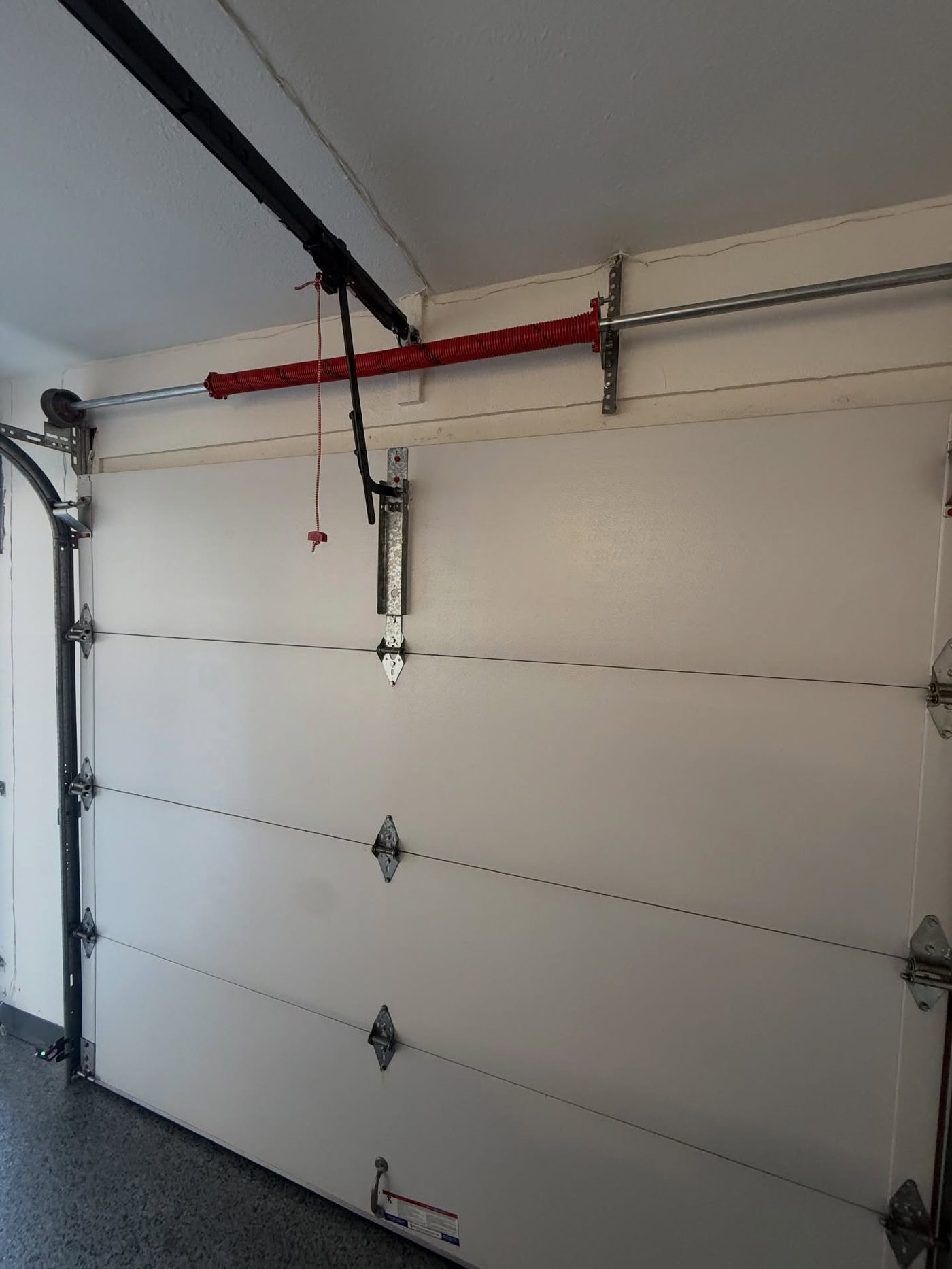 Garage door interior with opener rail
